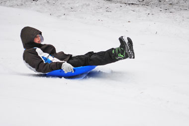 sliding down hill in saucer